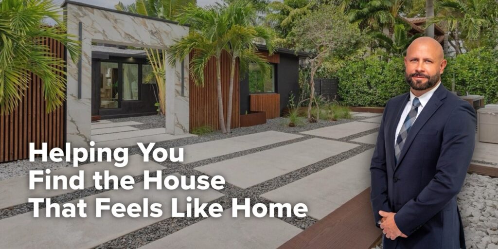 Real estate agent standing in front of a house